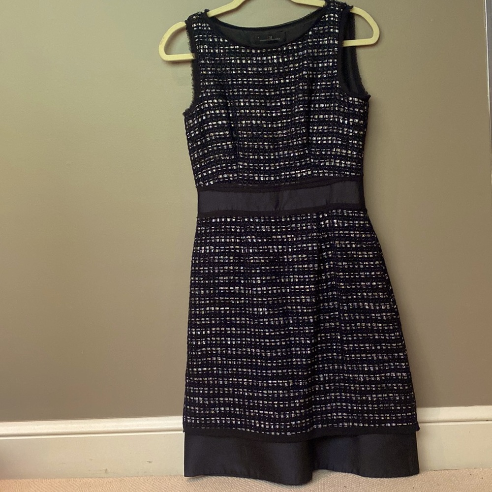 Carolina Herrera , dressier dress, tweed on top, taffeta on bottom hem